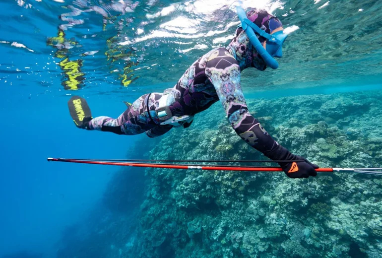Yacht golf set with biodegradable balls on a catamaran swim platform